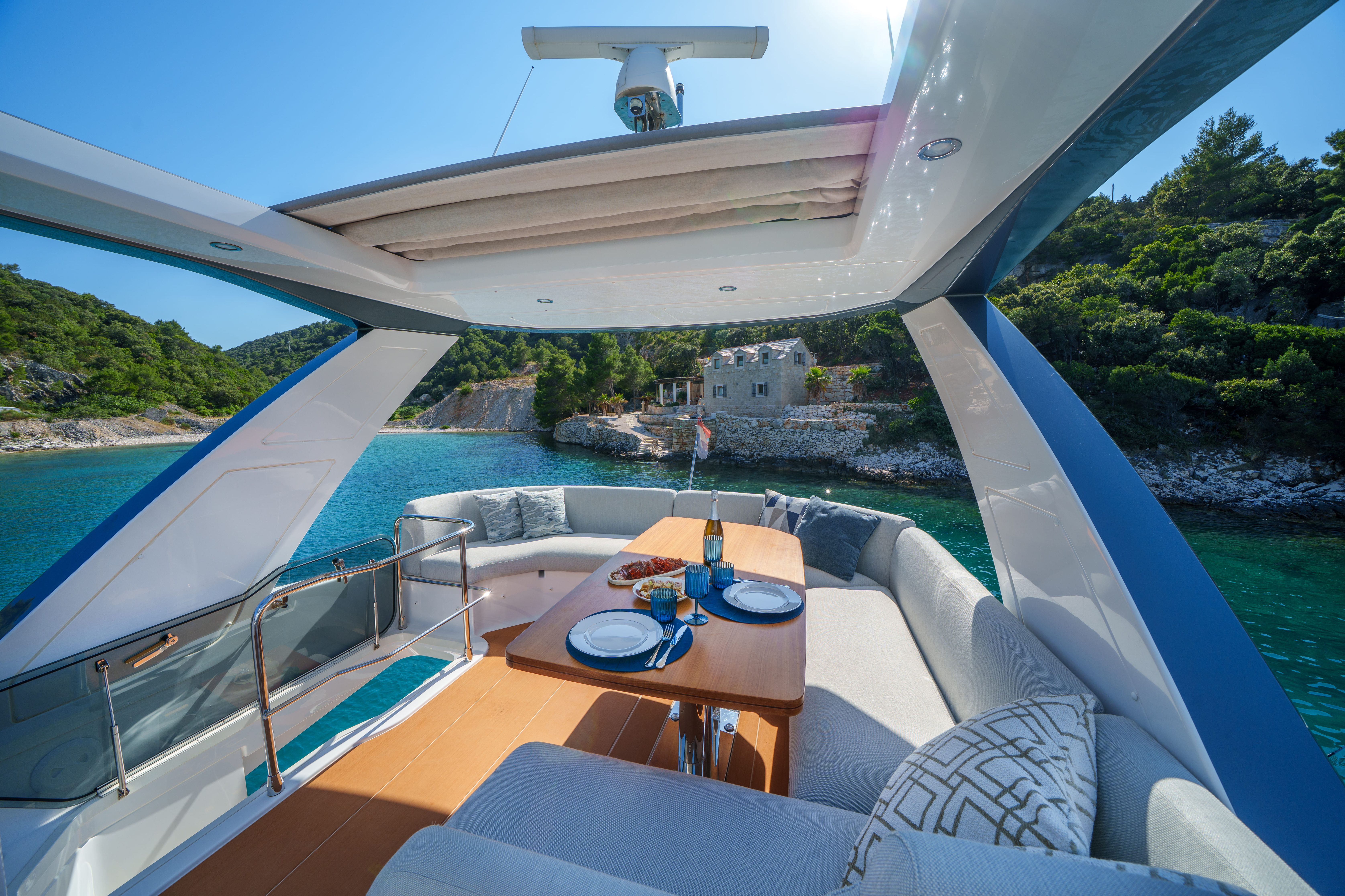 White yacht flybridge and outdoor spaces