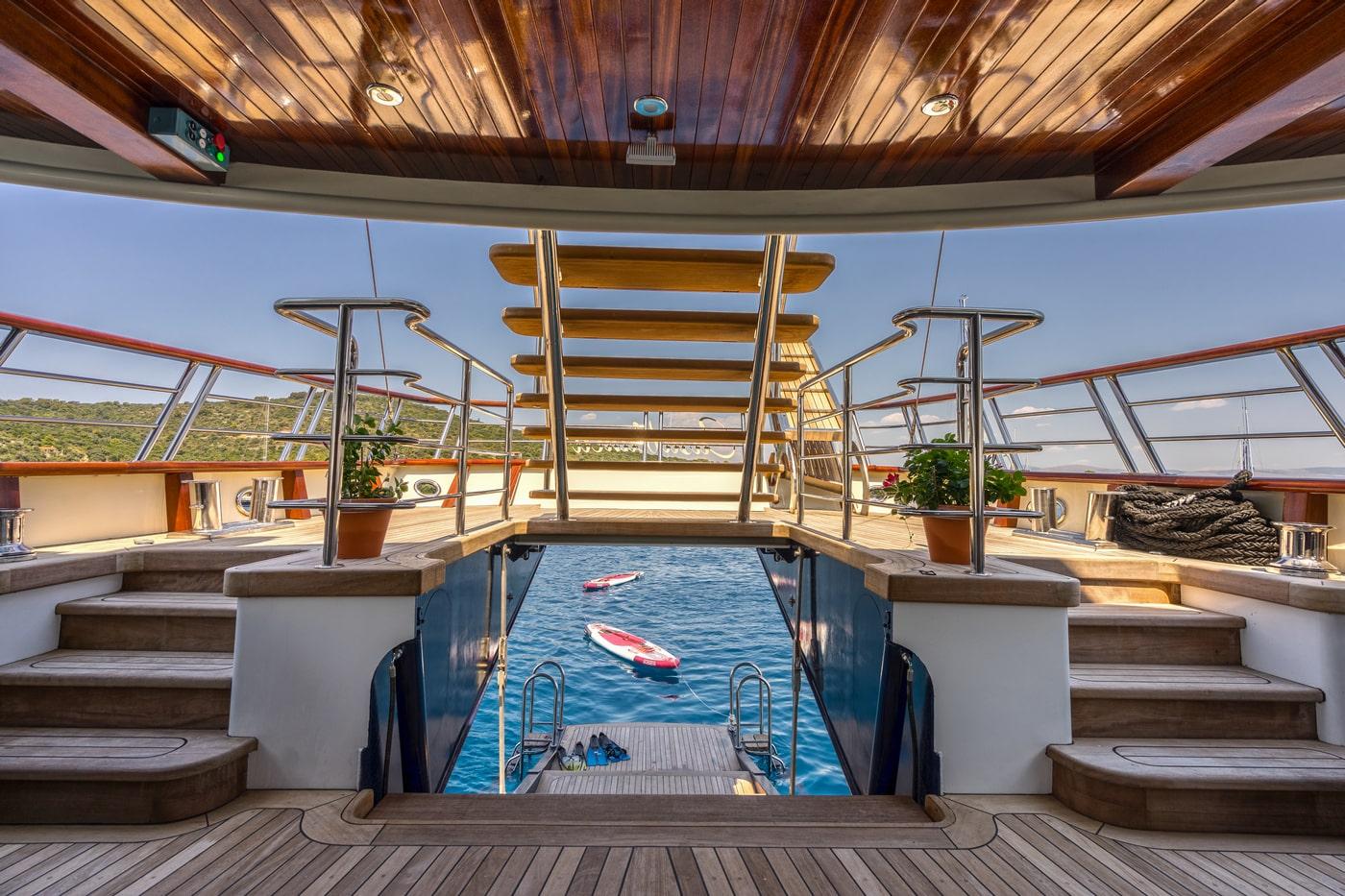 luxury yacht aft deck with swim platform and water toys