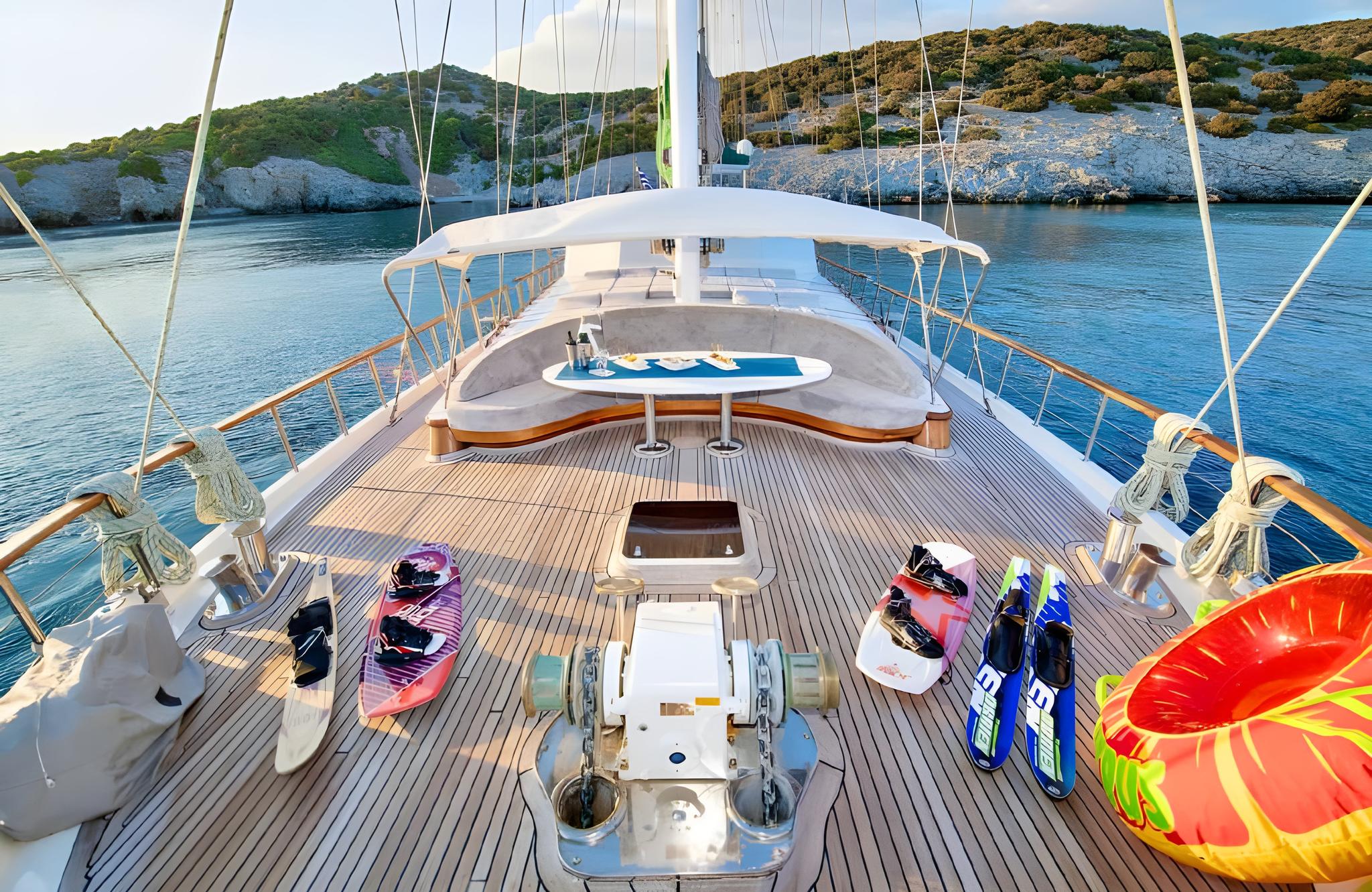 gulet bow deck showing snorkeling gear, fins, water sports equipment and inflatable ring