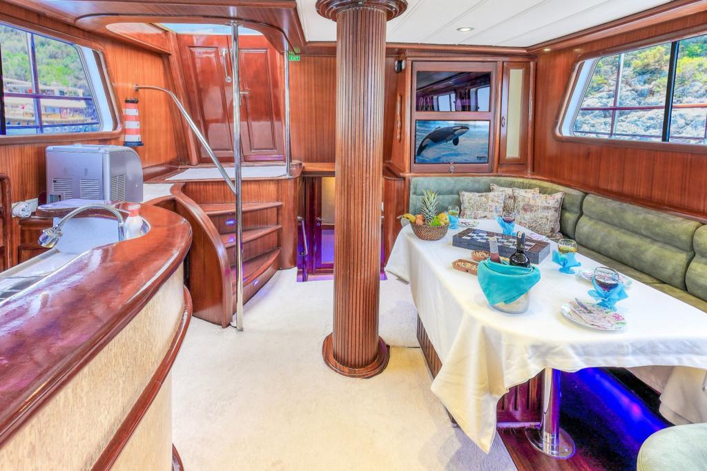 yacht interior jacuzzi with entertainment seating area and mounted TV screen